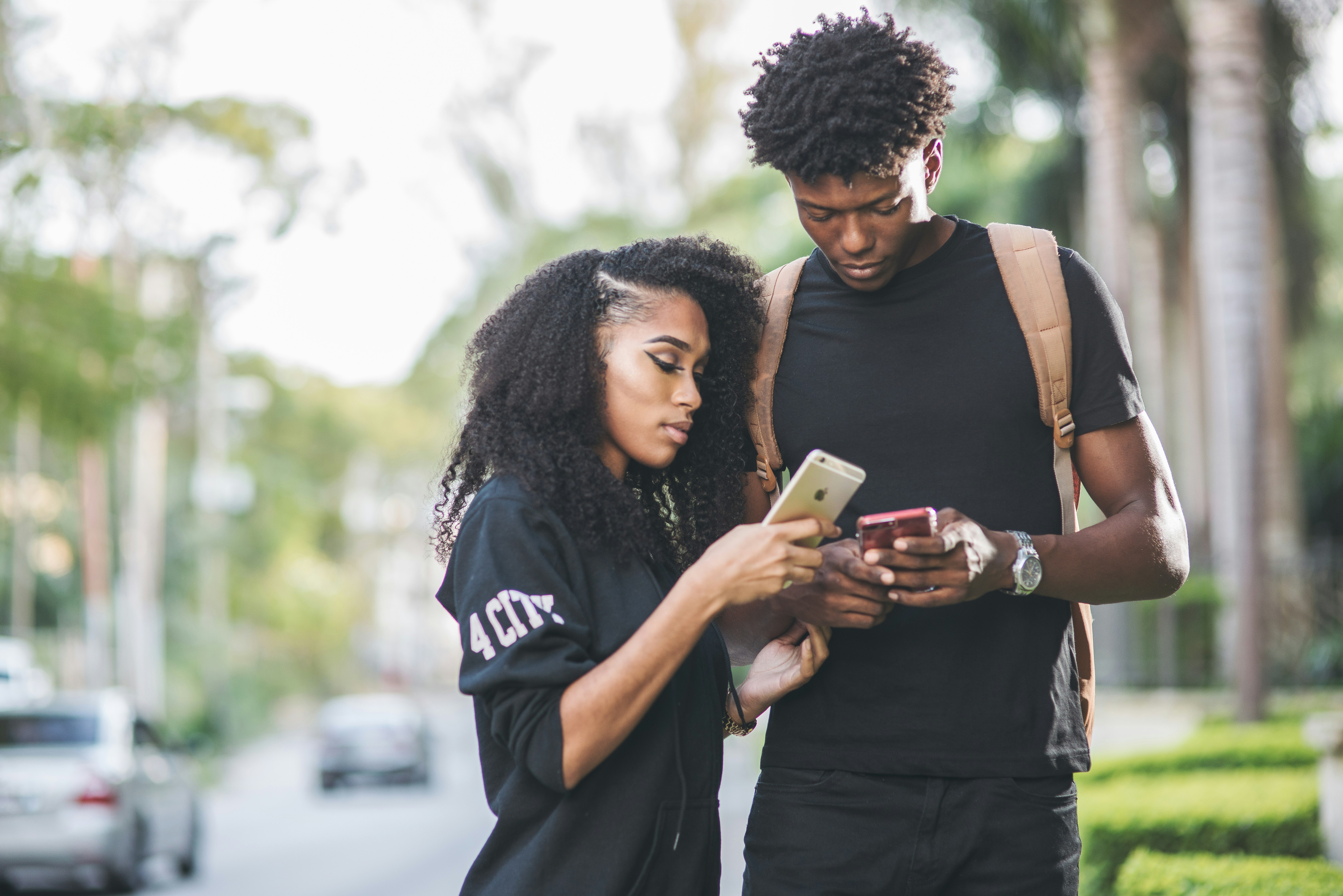 African business people using mobile payment